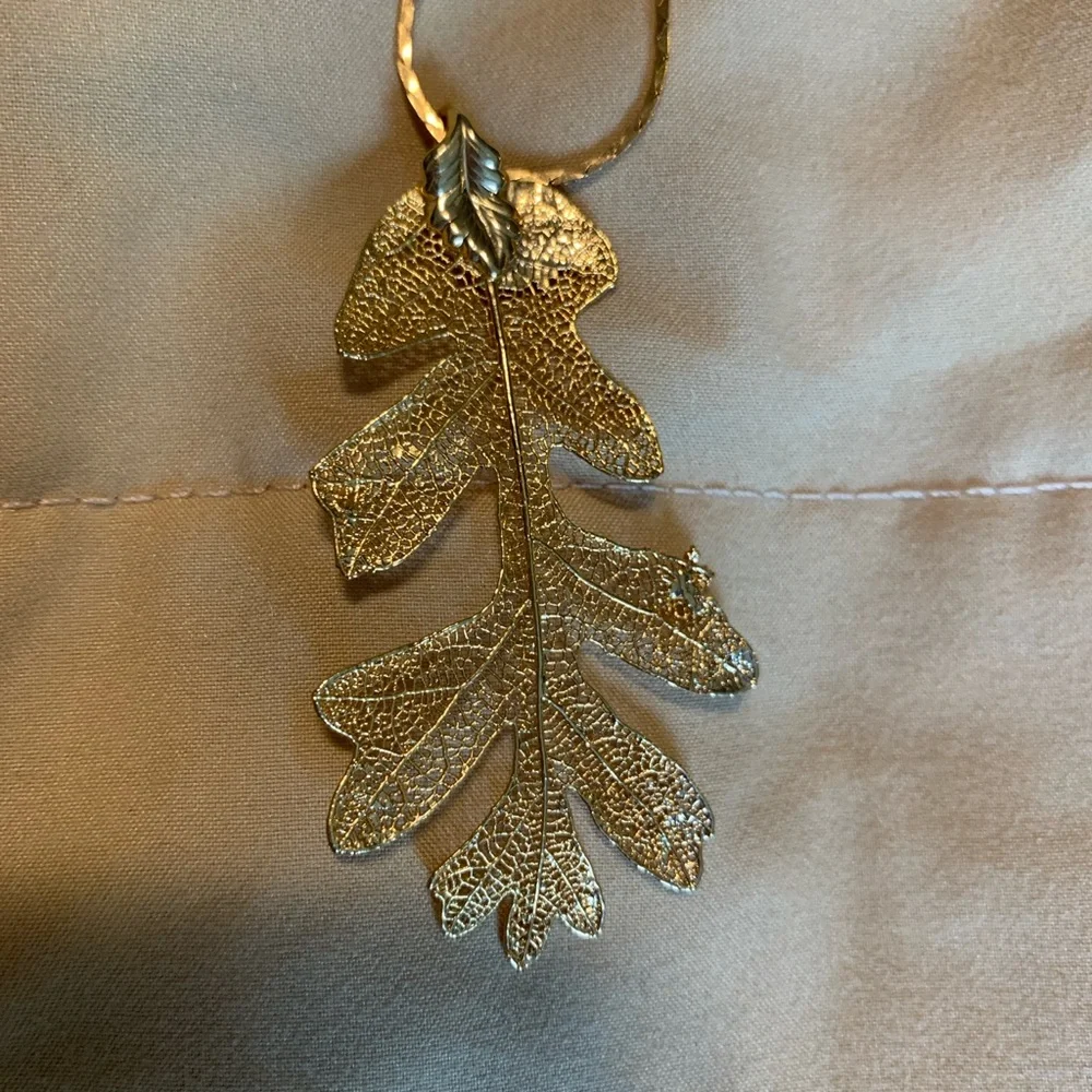 Real leaf dipped in gold pendant